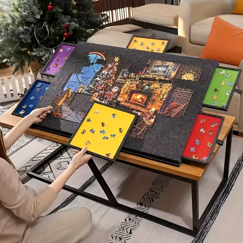 https://cdn.shopify.com/s/files/1/0743/8945/5069/files/Puzzle_Board_with_6_Drawers_1500_Piece_-_Portable_Foldable_Puzzle_Table_Felt_Surface_Storage_Organizer_for_Adults.avif?v=1767045647