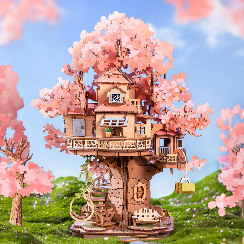 https://cdn.shopify.com/s/files/1/0799/2600/1971/files/cherry_blossom_tree_house.webp?v=1750534501