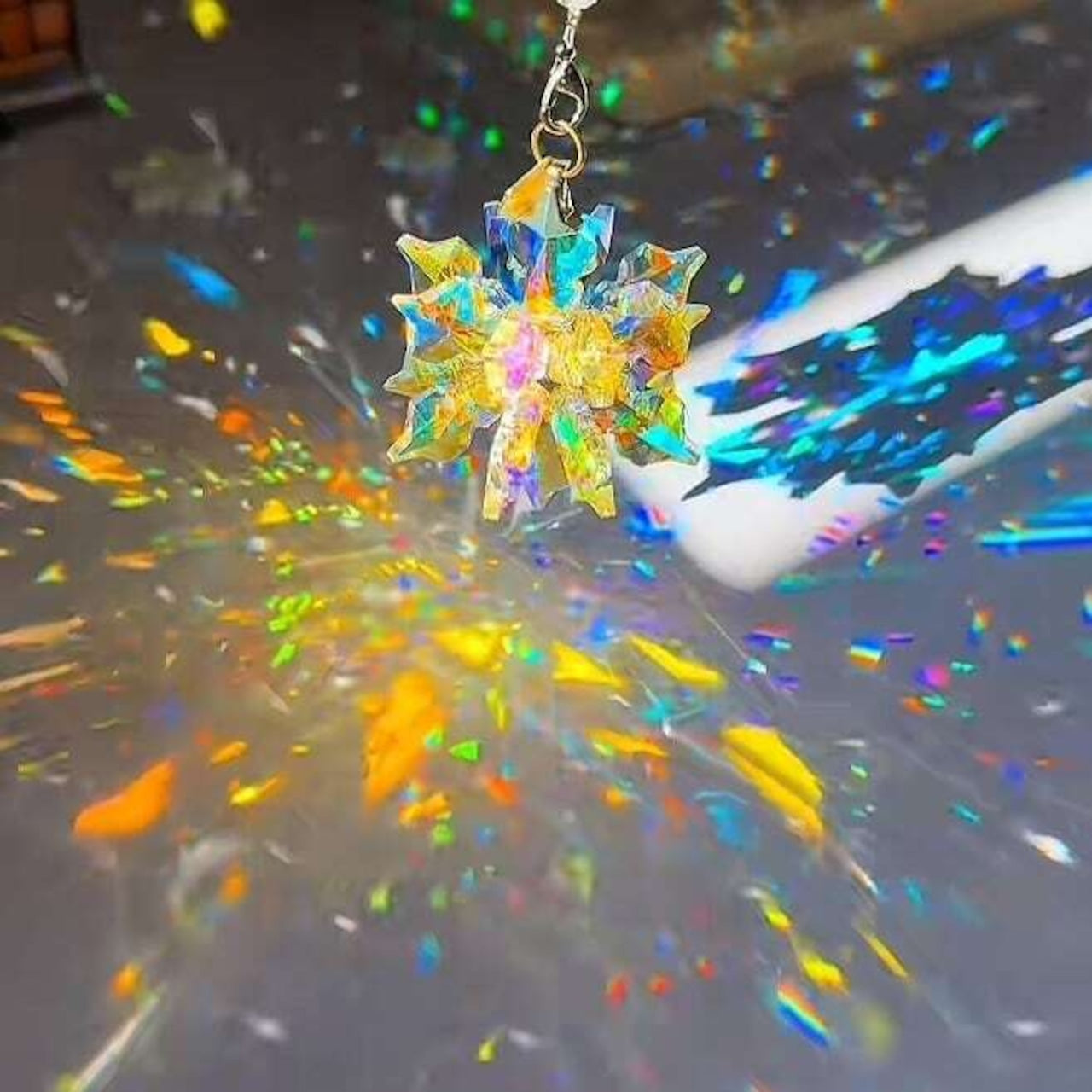 Lightbloom Snow variation crystal suncatcher by Sashura, clear natural stone window prism