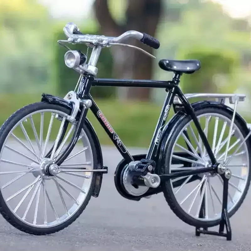 https://cdn.shopify.com/s/files/1/0743/8945/5069/files/puzzloria-1-10-scale-diy-retro-bicycle-model-kit-51-piece-zinc-alloy-nostalgic-assembly-3.jpg?v=1764084103