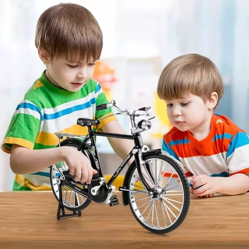 https://cdn.shopify.com/s/files/1/0743/8945/5069/files/puzzloria-1-10-scale-diy-retro-bicycle-model-kit-51-piece-zinc-alloy-nostalgic-assembly-7.jpg?v=1764084103
