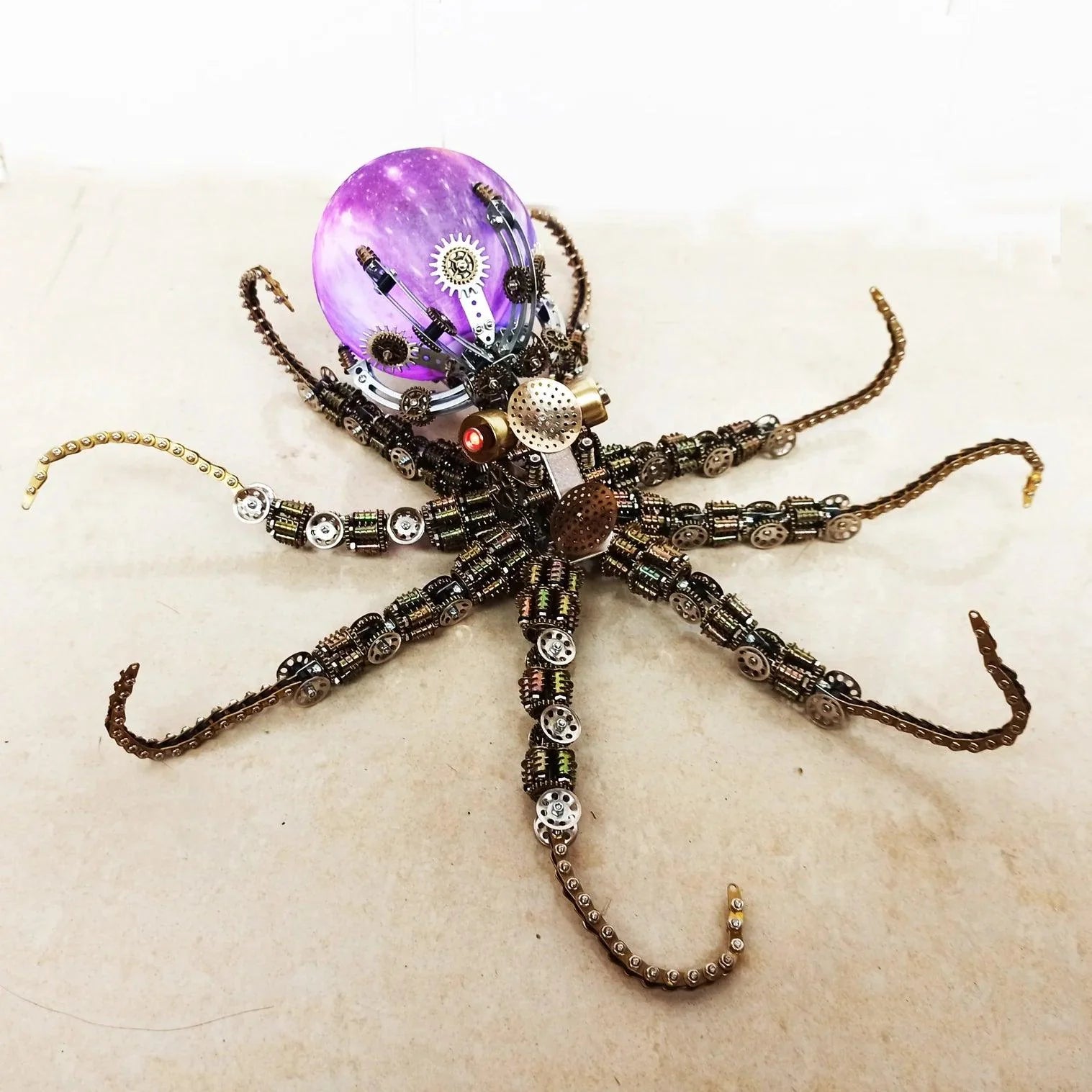 https://cdn.shopify.com/s/files/1/0743/8945/5069/files/puzzloria-3d-metal-puzzle-star-light-puzzloria-galactic-kraken-3d-metal-steampunk-puzzle-purple.webp?v=1747694167