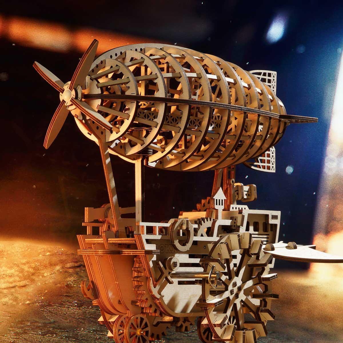 https://cdn.shopify.com/s/files/1/0743/8945/5069/files/puzzloria-3d-wooden-puzzle-default-title-puzzloria-celestial-navigator-mechanical-steampunk-airship-model-43347836469469.jpg?v=1747697296
