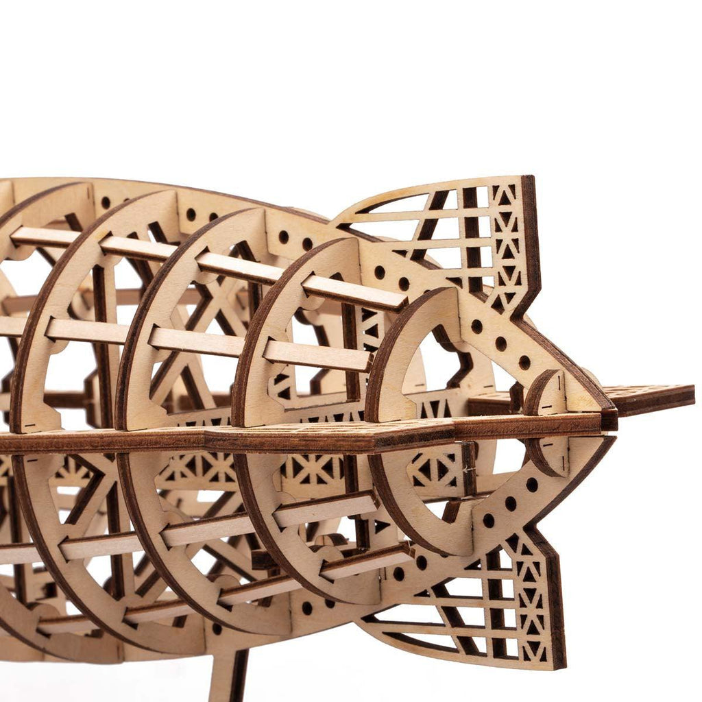 https://cdn.shopify.com/s/files/1/0743/8945/5069/files/puzzloria-3d-wooden-puzzle-default-title-puzzloria-celestial-navigator-mechanical-steampunk-airship-model-43347836535005.jpg?v=1745185560