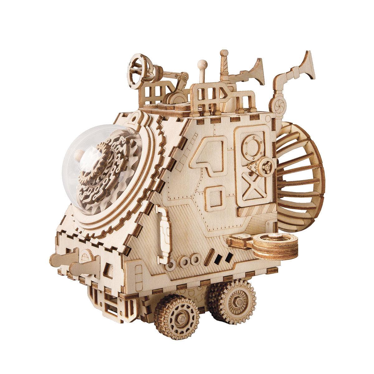 https://cdn.shopify.com/s/files/1/0743/8945/5069/files/puzzloria-3d-wooden-puzzle-default-title-puzzloria-cosmic-voyager-steampunk-spaceship-music-box-kit-43347833946333.jpg?v=1745185395