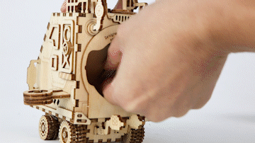 https://cdn.shopify.com/s/files/1/0743/8945/5069/files/puzzloria-3d-wooden-puzzle-default-title-puzzloria-cosmic-voyager-steampunk-spaceship-music-box-kit-43347834044637.gif?v=1769107066