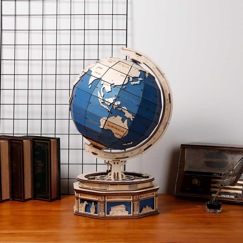 https://cdn.shopify.com/s/files/1/0743/8945/5069/files/puzzloria-3d-wooden-puzzle-default-title-puzzloria-explorer-s-collection-wooden-globe-monocular-telescope-set-43347846660317.jpg?v=1745185703