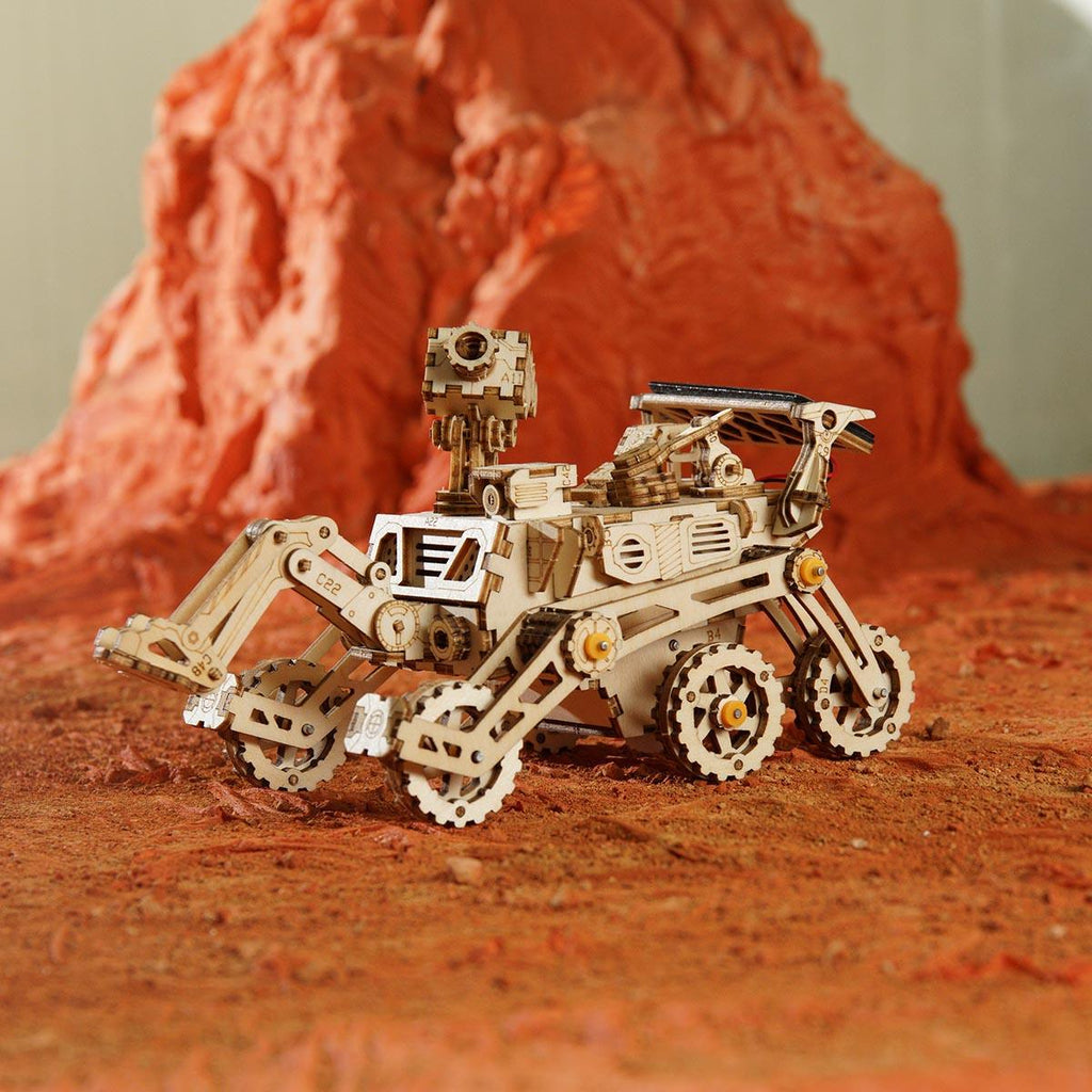 https://cdn.shopify.com/s/files/1/0743/8945/5069/files/puzzloria-3d-wooden-puzzle-default-title-puzzloria-harbinger-rover-solar-powered-mars-exploration-model-kit-43347820282077.jpg?v=1745185767