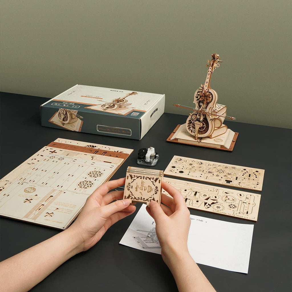 https://cdn.shopify.com/s/files/1/0743/8945/5069/files/puzzloria-3d-wooden-puzzle-default-title-puzzloria-magic-cello-mechanical-music-box-3d-wooden-puzzle-43347461406941.jpg?v=1746710249