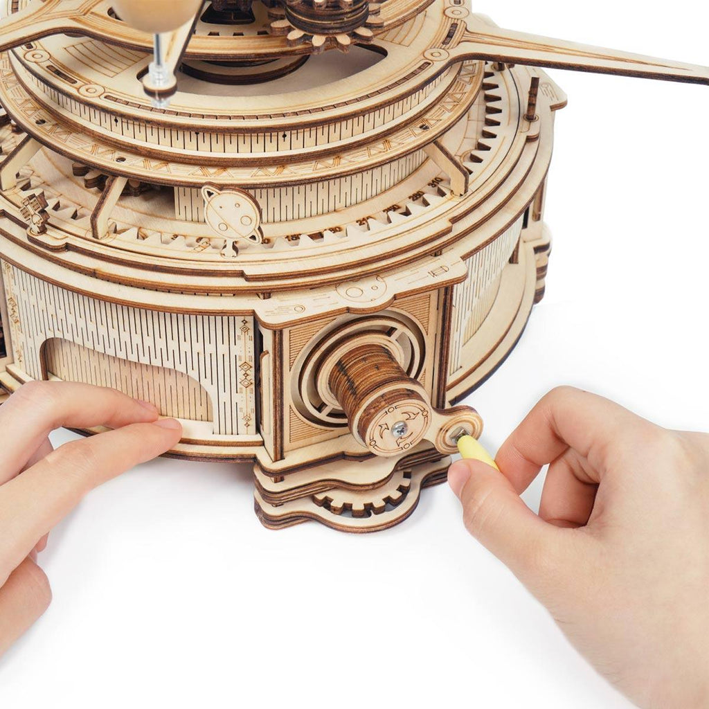 https://cdn.shopify.com/s/files/1/0743/8945/5069/files/puzzloria-3d-wooden-puzzle-deluxe-wooden-orbital-puzzloria-celestial-explorer-mechanical-orrery-43347851444445.jpg?v=1745185539