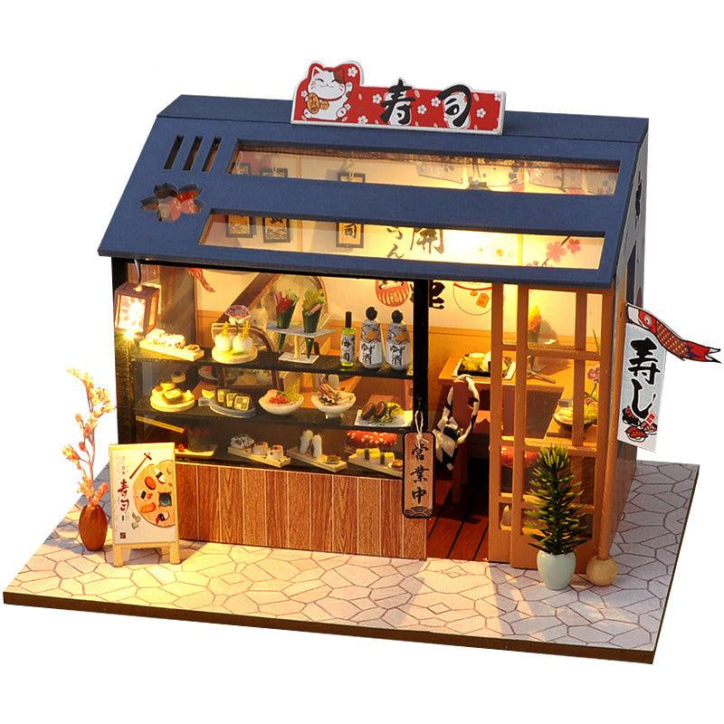https://cdn.shopify.com/s/files/1/0743/8945/5069/files/puzzloria-diy-miniature-cute-sushi-puzzloria-diy-dollhouse-kit-dream-shop-1-43347882770653.jpg?v=1745185834