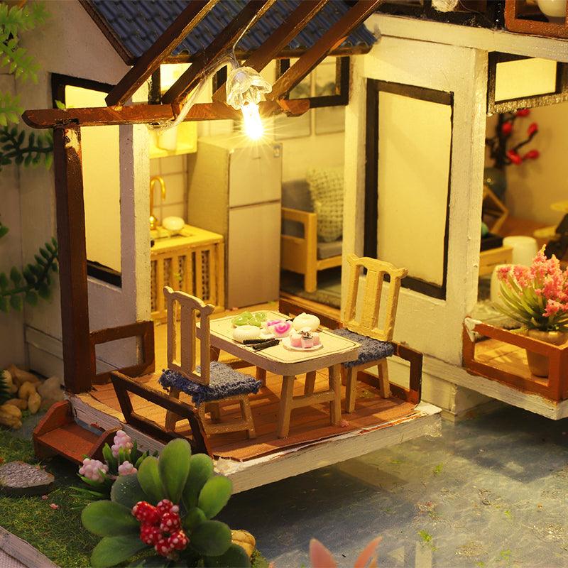https://cdn.shopify.com/s/files/1/0743/8945/5069/files/puzzloria-diy-miniature-default-title-puzzloria-diy-dollhouse-kit-bamboo-courtyard-43347867631837.jpg?v=1745185889