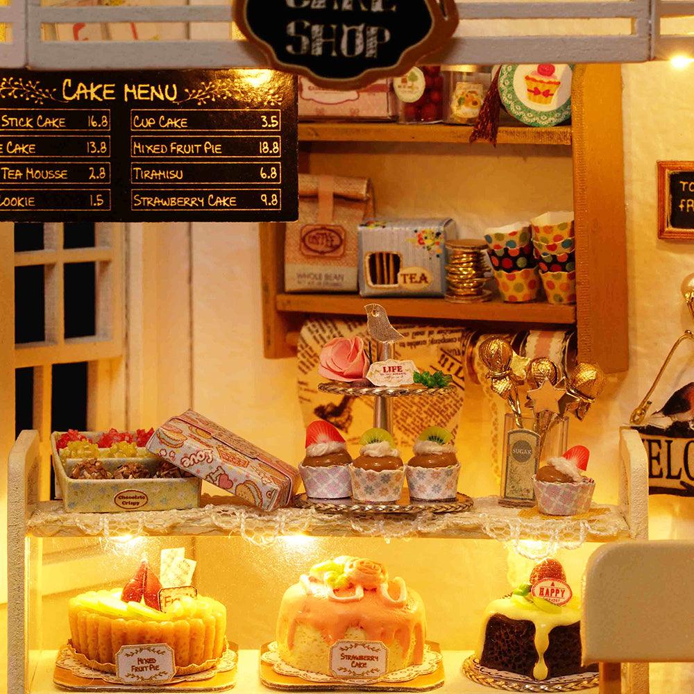 https://cdn.shopify.com/s/files/1/0743/8945/5069/files/puzzloria-diy-miniature-default-title-puzzloria-diy-dollhouse-kit-cake-diary-43347894993117.jpg?v=1745185840