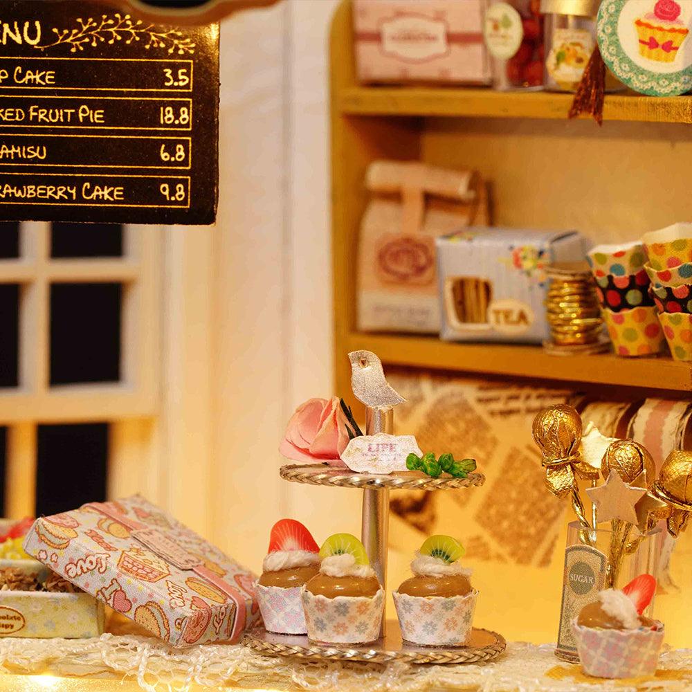 https://cdn.shopify.com/s/files/1/0743/8945/5069/files/puzzloria-diy-miniature-default-title-puzzloria-diy-dollhouse-kit-cake-diary-43347895058653.jpg?v=1745185817