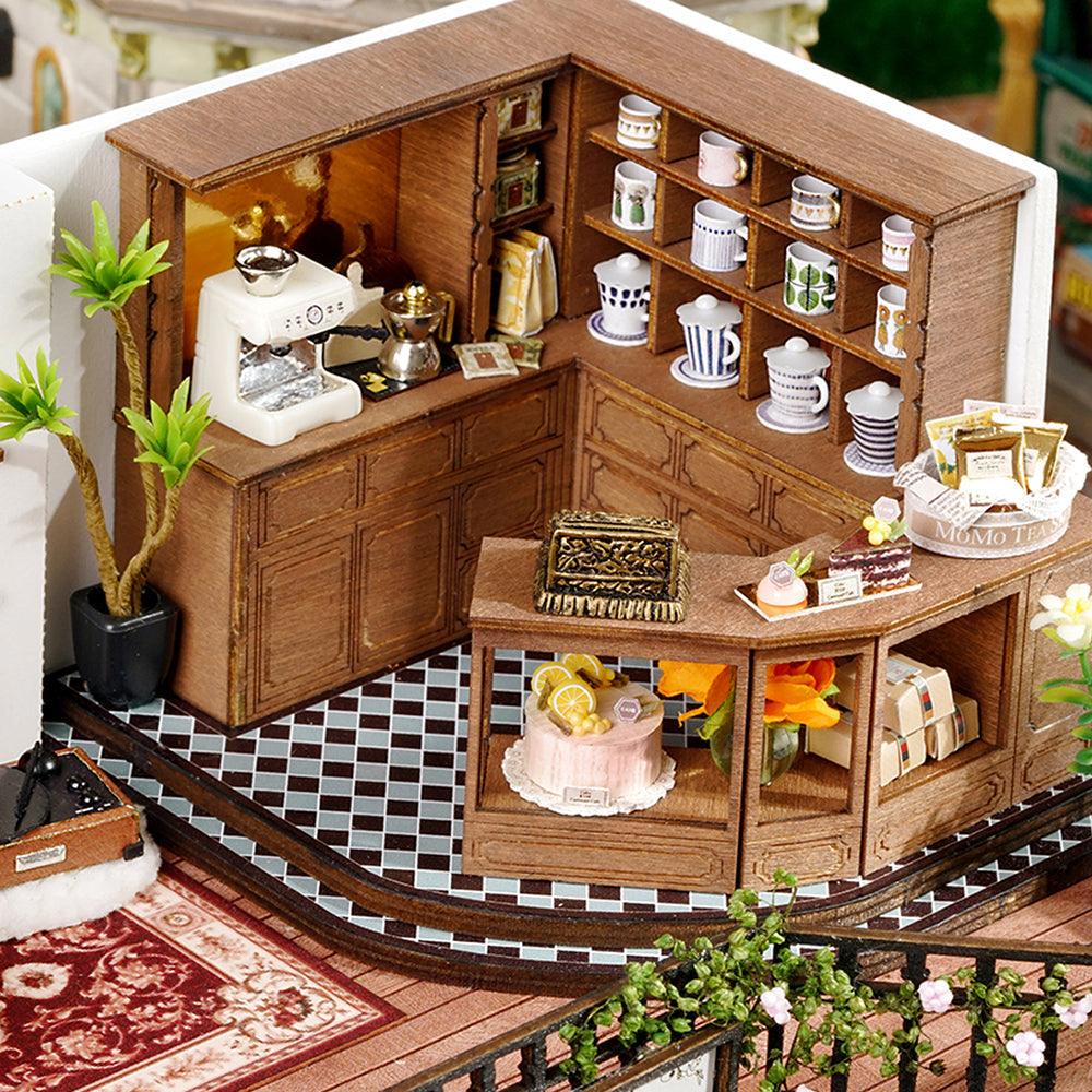 https://cdn.shopify.com/s/files/1/0743/8945/5069/files/puzzloria-diy-miniature-default-title-puzzloria-diy-dollhouse-kit-forest-teashop-43347885555933.jpg?v=1745185736