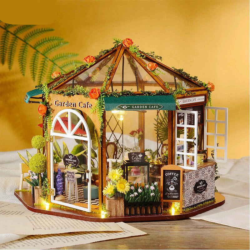 https://cdn.shopify.com/s/files/1/0743/8945/5069/files/puzzloria-diy-miniature-default-title-puzzloria-diy-dollhouse-kit-garden-cafe-43347898368221.jpg?v=1749504145