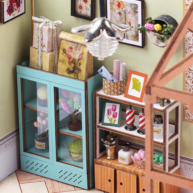https://cdn.shopify.com/s/files/1/0743/8945/5069/files/puzzloria-diy-miniature-default-title-puzzloria-diy-dollhouse-kit-jenny-s-greenhouse-43347946111197.jpg?v=1745185867
