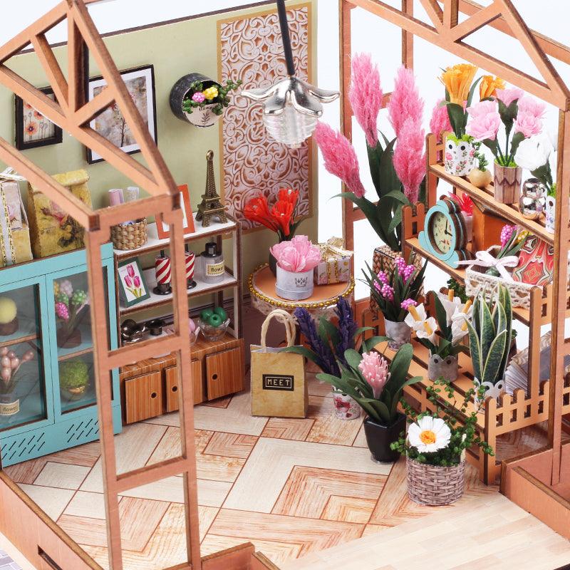 https://cdn.shopify.com/s/files/1/0743/8945/5069/files/puzzloria-diy-miniature-default-title-puzzloria-diy-dollhouse-kit-jenny-s-greenhouse-43347946176733.jpg?v=1745185947