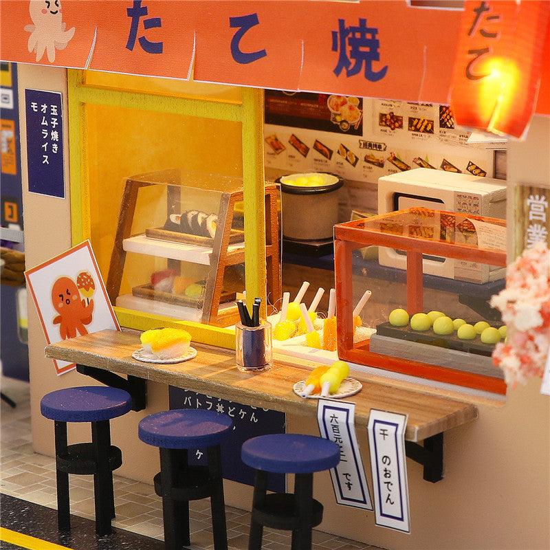 https://cdn.shopify.com/s/files/1/0743/8945/5069/files/puzzloria-diy-miniature-default-title-puzzloria-diy-dollhouse-kit-star-takoyaki-43347881427165.jpg?v=1745185902