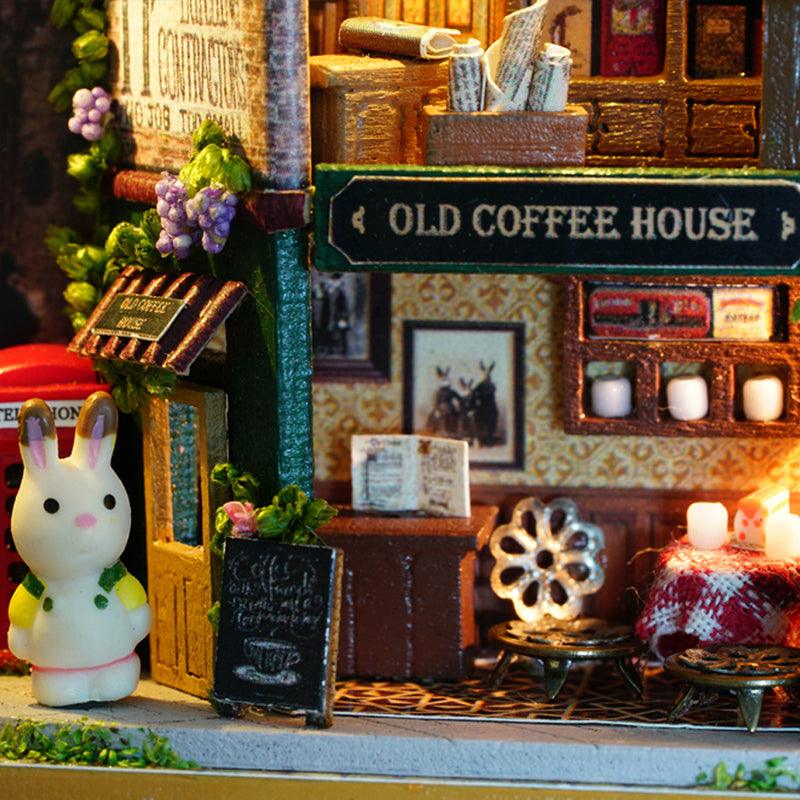 https://cdn.shopify.com/s/files/1/0743/8945/5069/files/puzzloria-diy-miniature-green-puzzloria-diy-dollhouse-kit-box-theater-43347948208349.jpg?v=1745185922