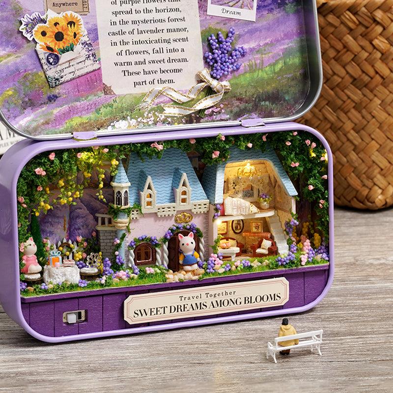 https://cdn.shopify.com/s/files/1/0743/8945/5069/files/puzzloria-diy-miniature-purple-puzzloria-diy-dollhouse-kit-box-theater-3-43347944538333.jpg?v=1745186045