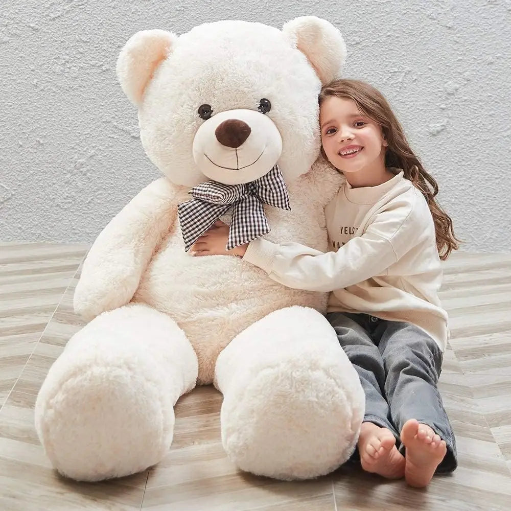 https://cdn.shopify.com/s/files/1/0743/8945/5069/files/puzzloria-giant-teddy-bear-4-feet-big-footprints-plush-stuffed-animals-1.webp?v=1760046325