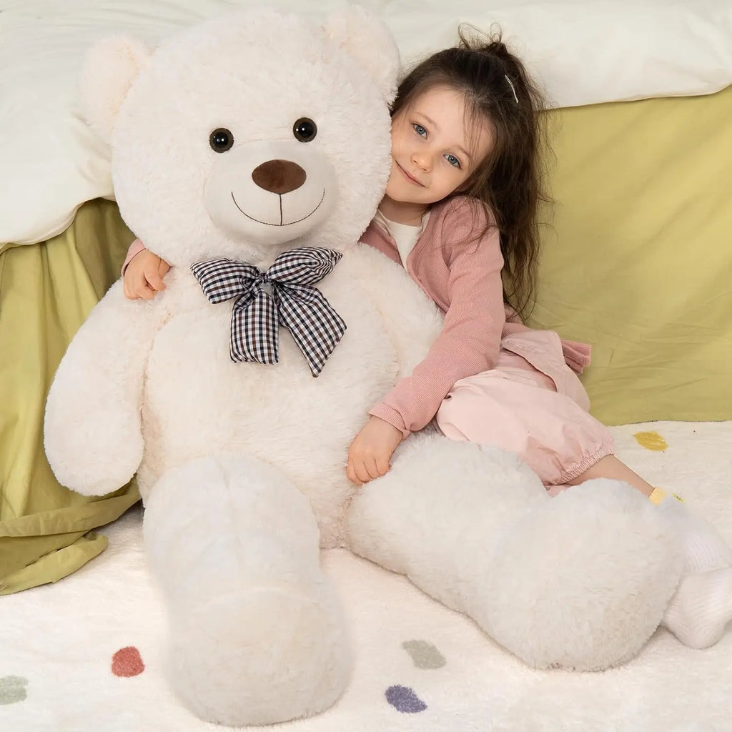 https://cdn.shopify.com/s/files/1/0743/8945/5069/files/puzzloria-giant-teddy-bear-4-feet-big-footprints-plush-stuffed-animals-4.webp?v=1760046352