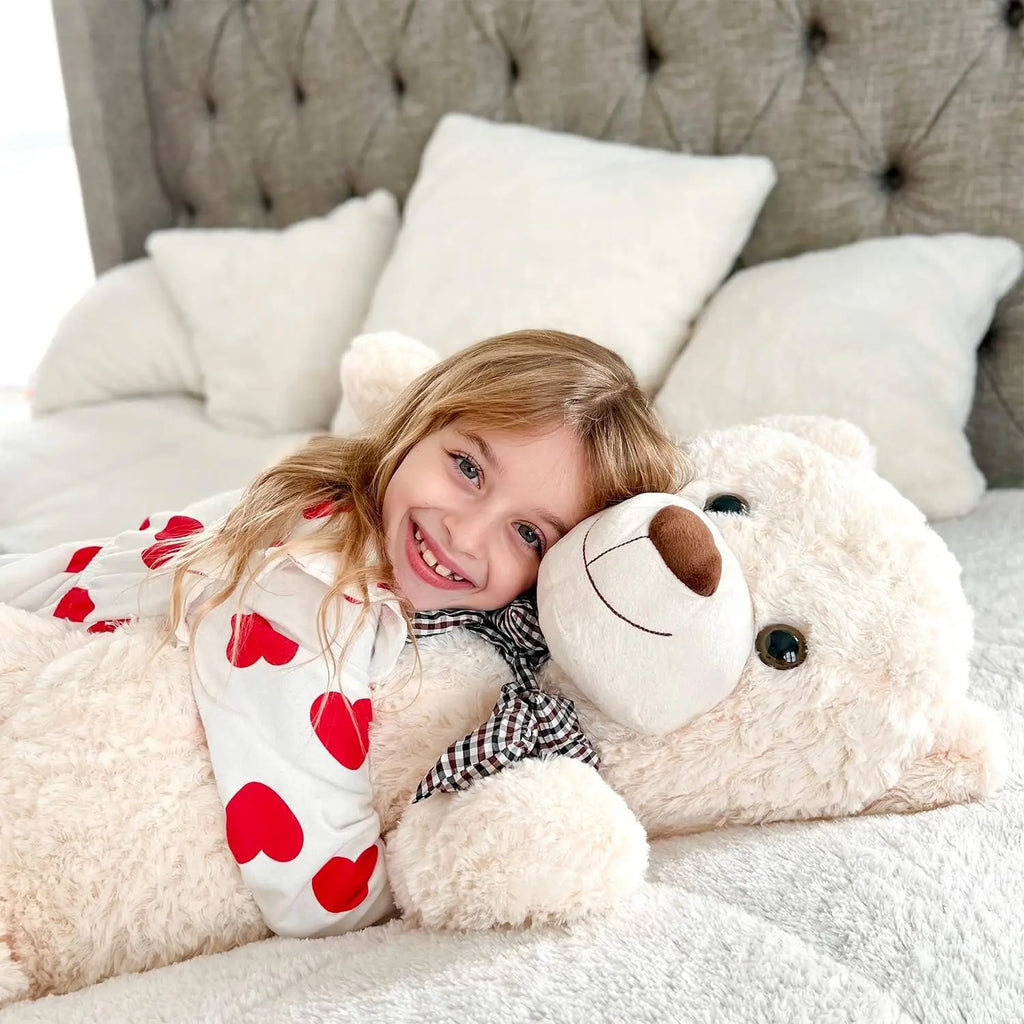 https://cdn.shopify.com/s/files/1/0743/8945/5069/files/puzzloria-giant-teddy-bear-4-feet-big-footprints-plush-stuffed-animals-6.webp?v=1760047296