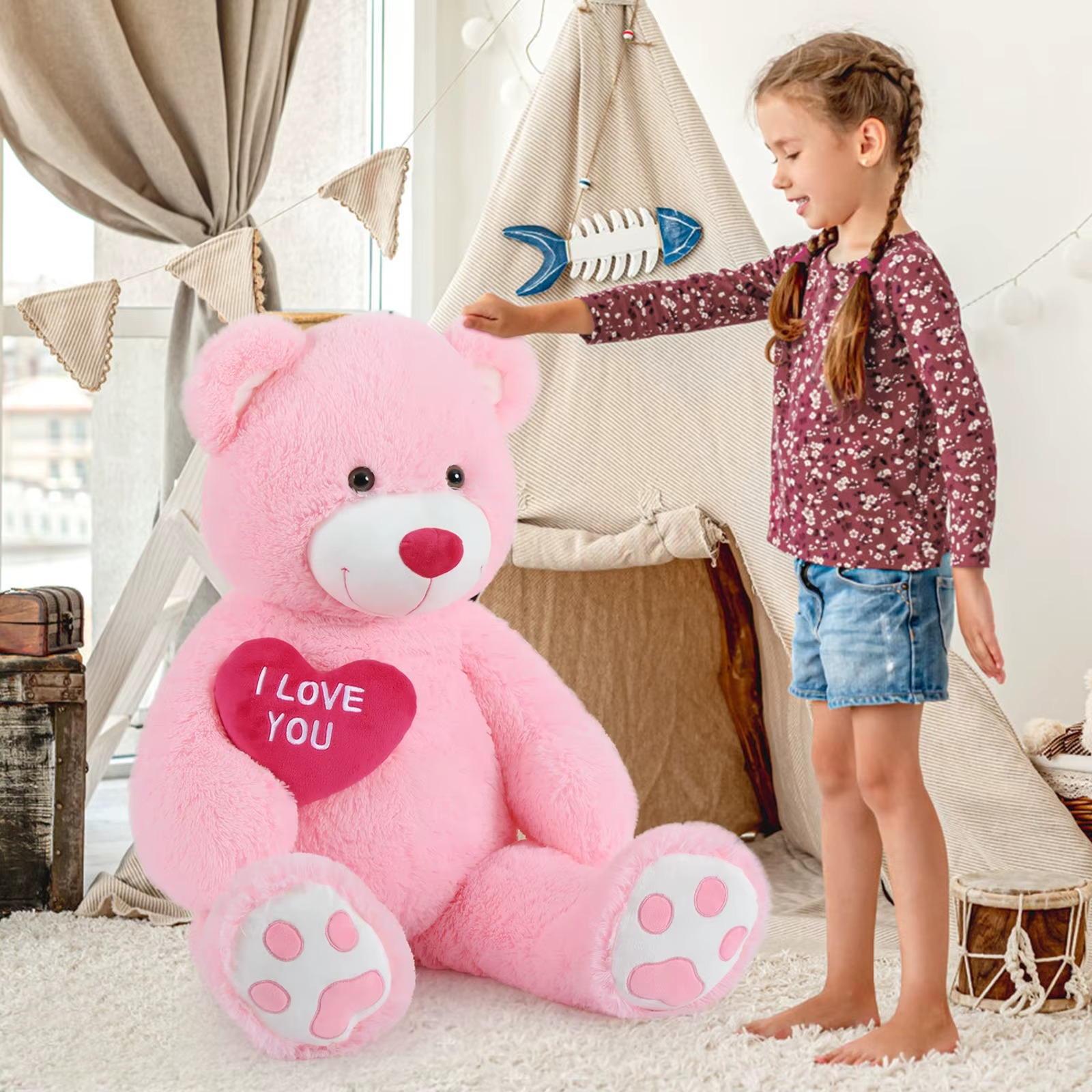 https://cdn.shopify.com/s/files/1/0743/8945/5069/files/puzzloria-giant-teddy-bear-4-feet-big-footprints-plush-stuffed-animals-pink-1.png?v=1765218427
