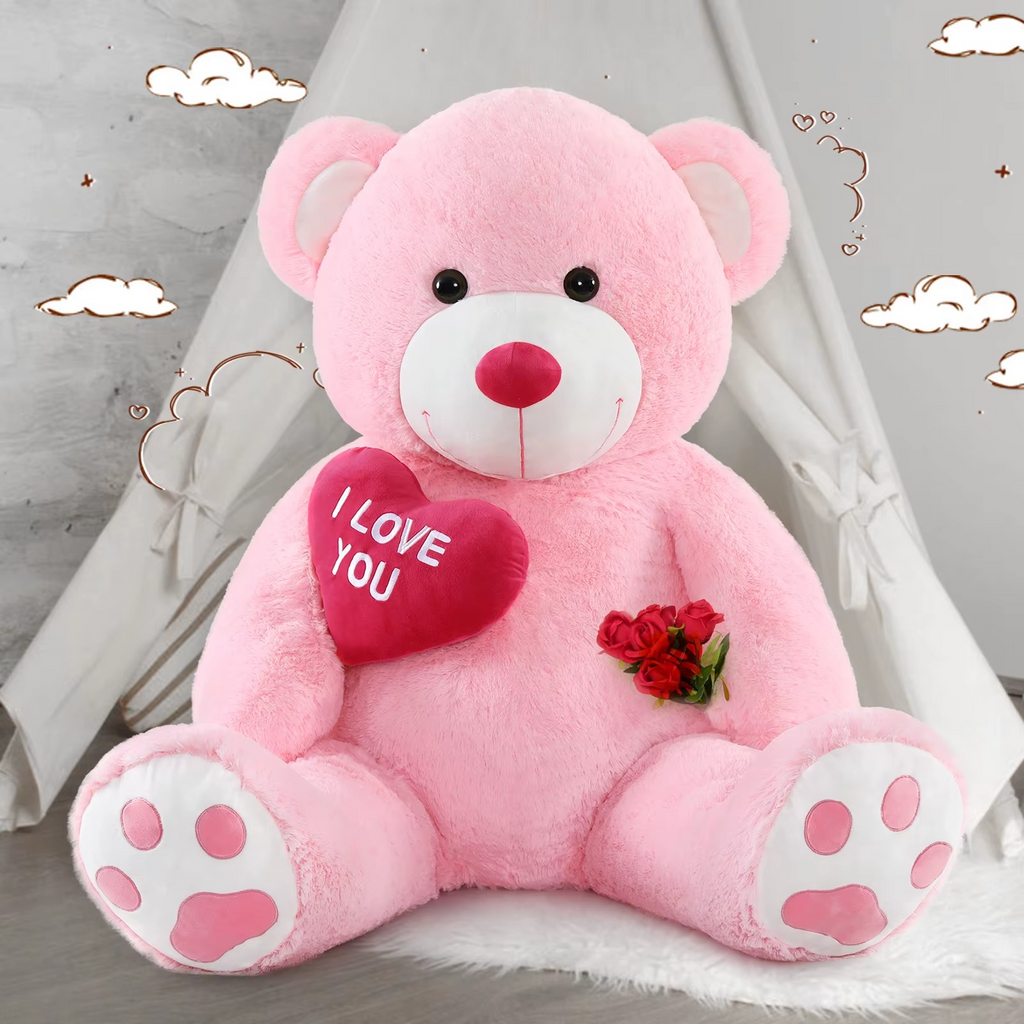 https://cdn.shopify.com/s/files/1/0743/8945/5069/files/puzzloria-giant-teddy-bear-4-feet-big-footprints-plush-stuffed-animals-pink-3.png?v=1765218455