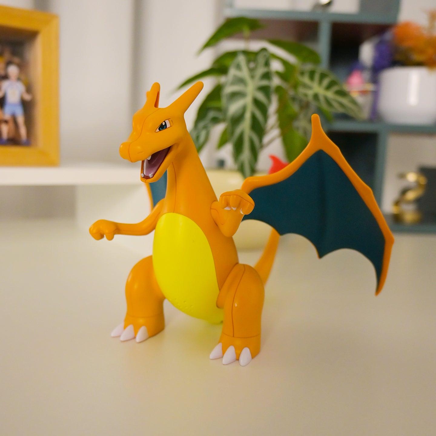 https://cdn.shopify.com/s/files/1/0743/8945/5069/files/puzzloria-interactive-fire-breathing-dragon-charizard-figure-4.jpg?v=1756207532