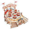 https://cdn.shopify.com/s/files/1/0743/8945/5069/files/puzzloria-tilt-a-whirl-diy-music-box-3d-wooden-puzzle-main.webp?v=1747693659