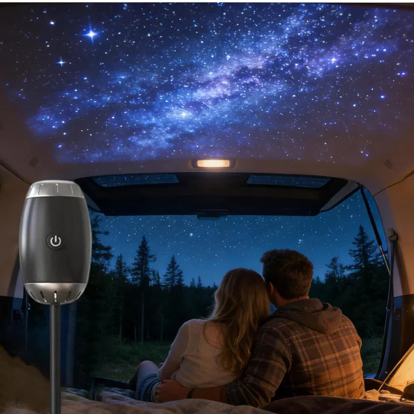 Couple relaxing under a dreamy star glow projected by the StarVeil AuraDrift Light, celestial ambient light for relaxation and sleep