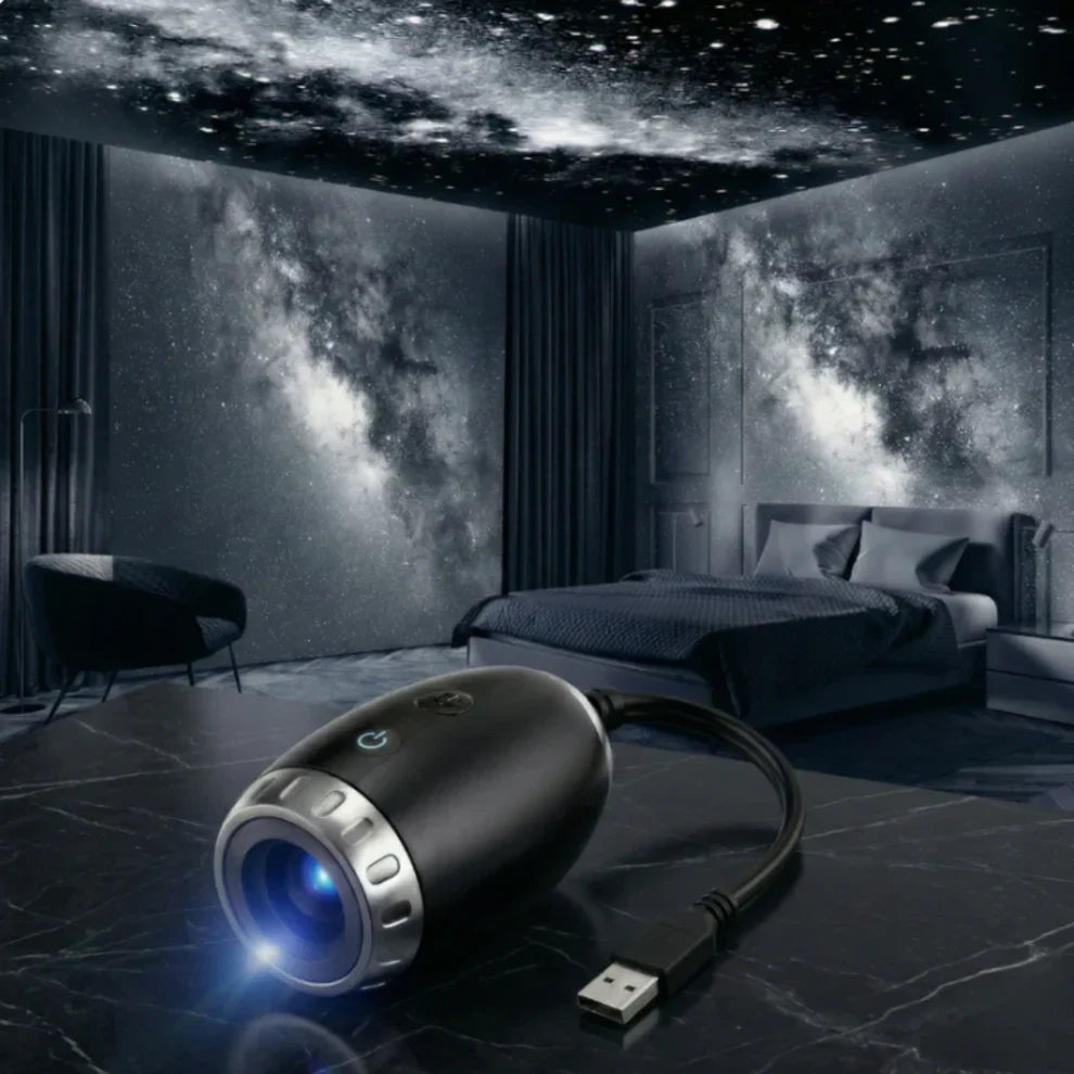 StarVeil AuraDrift Light in matte black projecting a vivid dreamy starfield onto a dark bedroom ceiling for sleep ambience